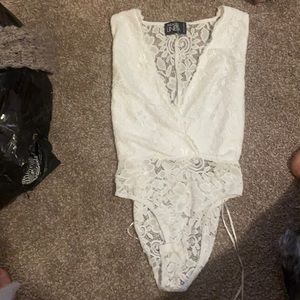 barely worn white lace body suit